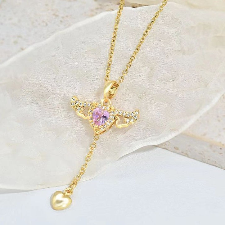 Collier en forme de cœur et d'ailes d'ange en mouvement avec chaîne