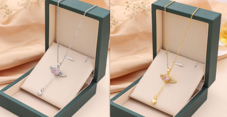 Collier en forme de cœur et d'ailes d'ange en mouvement avec chaîne