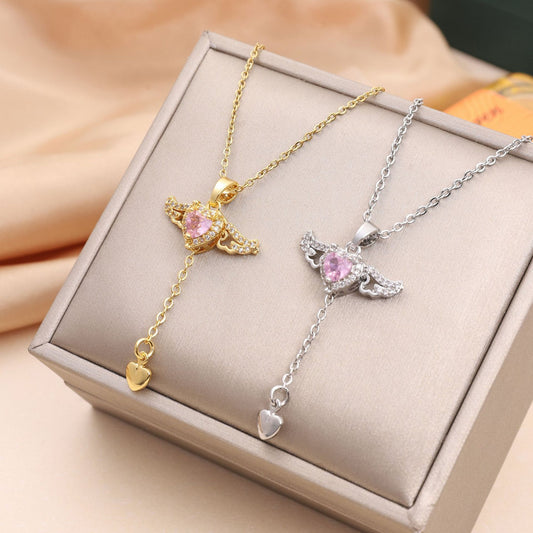 Collier en forme de cœur et d'ailes d'ange en mouvement avec chaîne